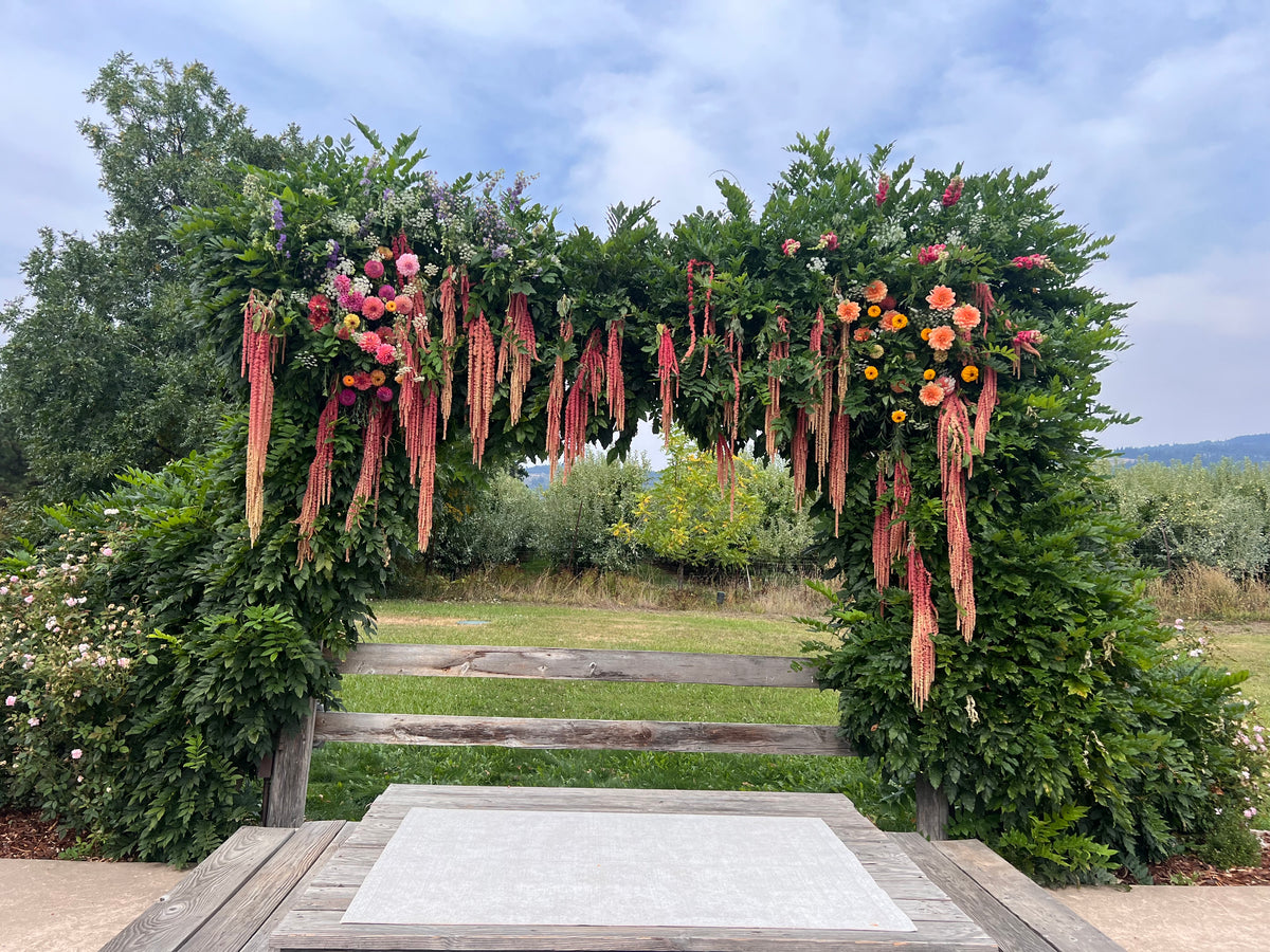 Large-scale fresh floral installation by Aster and Bliss